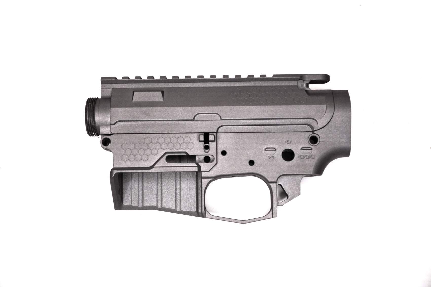 Billet Receiver Set – Precision-Machined Performance Not only does this receiver set look incredible, but its performance is in a league of its own. Designed with the shooter in mind, this set blends cutting-edge engineering with premium materials for a reliable, high-performance foundation. This set is CNC machined from aircraft-grade billet aluminum, delivering unmatched strength, consistency, and rigidity. The precise machining process ensures tight tolerances and superior fitment between components. Whether you're building for competition, duty use, or personal defense, this material and method provide an elite starting point. Our proprietary magwell design is 80% larger, dramatically improving reload efficiency under stress. Despite the increased size, the design uses 20% less material overall, optimizing both weight and performance. This innovation allows shooters to confidently and quickly seat magazines, even in high-pressure scenarios. All components are manufactured in Colorado or sourced from 100% U.S.-based partners. This commitment to domestic production ensures quality control and supports American manufacturing. Every detail, from machining to coatings, reflects our dedication to excellence and accountability. The receiver set includes a bolt release screw and an anti-rattle screw to streamline your build and enhance reliability. These small additions make a big difference by reducing movement and noise while increasing ease of installation. You’ll notice the solid, refined feel from the first time you handle it. Each set comes professionally finished in Cerakote, offering excellent resistance to wear, corrosion, and harsh environments. The finish not only protects but also gives the receiver a clean, aggressive appearance. Choose a color that fits your build — and know it’s built to last. 🔒 MUST SHIP TO A VALID FFL DEALER