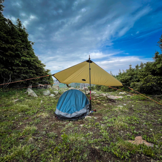 Kifaru Sheep Tarp When every ounce and inch of space matters, the Kifaru Sheep Tarp delivers maximum protection with minimal weight. Designed as an ultralight emergency shelter, this tarp is compact enough to disappear into any daypack but tough enough to stand up to harsh backcountry conditions. Whether you're stalking high-alpine terrain or pushing the limits on a day hunt, this tarp ensures you’re never caught unprepared. Crafted for versatility, the Sheep Tarp can be deployed as a flat tarp, lean-to, or enclosed shelter using trekking poles. With its wind resistance rated beyond 60 mph and complete waterproof construction, it stands up to the elements in all its configurations. Included cordage gives you quick setup options in unpredictable conditions, keeping your gear dry and your body protected in emergencies or impromptu bivy situations. At just 112" x 60", this tarp offers ample coverage for a single person and their gear while maintaining a low-profile footprint. With the addition of eight stakes or pegs of your choice, it becomes a reliable piece of backcountry insurance. Whether you’re planning to bivouac or simply want a just-in-case solution, the Kifaru Sheep Tarp is a must-have for mountain hunters, ultralight trekkers, and backcountry adventurers. Components: Flat dimensions: 112" long x 60" wide Includes 16 feet of setup cordage Requires 8 pegs (not included) for optimal pitch Wind-resistant rated to 60+ mph Fully waterproof material Notes: Ultralight and compact — ideal for stashing in any daypack Compatible with multiple pitch styles Designed for emergency or minimalist use Be ready when the weather turns or the day runs long — the Kifaru Sheep Tarp adds peace of mind without weighing you down.