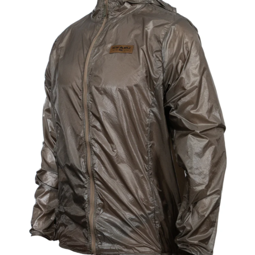 Kifaru Wind River Jacket – Lightweight Wind Layer with Packable Design Built for mountain hunts and high-output backcountry pursuits, the Wind River Jacket is the ultimate ultralight wind layer to round out your layering system. Constructed from 30D high-tenacity ripstop nylon, this jacket is designed to block wind without adding bulk or weight, making it an ideal piece to keep in your pack year-round. When the weather turns, the Wind River provides essential protection and breathability to keep you moving confidently in exposed terrain. One of the standout features of this jacket is its ability to pack into its own integrated front pocket. Once packed, it features a secure tab loop designed to attach directly to key hooks in Kifaru packs or other gear systems, ensuring it’s always within reach without taking up space inside your pack. Whether you’re glassing on a windy ridgeline or navigating gusty trails, the Wind River is a no-fuss solution to sudden weather shifts. Designed with ergonomics in mind, the Wind River features a hood, cuffs, and back hem fitted with integrated bungee. These subtle adjustments allow the jacket to move naturally with your body while maintaining a trim fit and sealing out the elements. While it’s not designed for rain, this jacket shines as a protective wind shell layered over your insulation or base layers. Components: 30D High Tenacity Ripstop Nylon Integrated Self-Pack Pocket with Gear Loop Tab Fitted Hood with Bungee Adjustment Elastic Cuffs and Hem for Secure Fit Ultralight & Compressible Construction Notes: Not waterproof—this is a wind shell, not a rain jacket Perfect as a top layer in dry but windy conditions Packs down to palm size and weighs next to nothing Stay prepared and protected without adding weight—Wind River Jacket is the wind-blocking layer you didn’t know you needed.