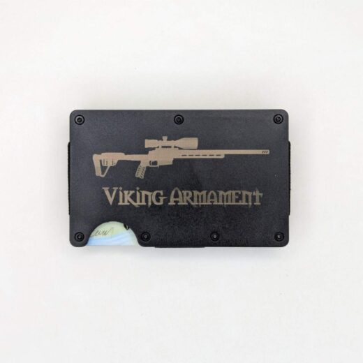 VA Wallet – Black Streamlined. Minimal. Built to last. The VA Wallet in Black is the perfect blend of function and form for anyone looking to slim down their carry without sacrificing capability. Crafted from lightweight, durable materials and engineered for a sleek, low-profile fit, this wallet is designed to handle the rigors of daily life while keeping your essentials secure. With RFID-blocking aluminum plates, it offers modern protection for your cards and identity. The compact design holds up to 12 cards comfortably and includes a robust cash strap to keep your bills tight and accessible. Whether you’re heading into the backcountry or out on the town, the VA Wallet delivers everyday reliability in a minimalist package. Machined hardware ensures the wallet stays rigid and secure, while its modular design allows for easy card access without unnecessary bulk. Its matte black finish gives it a sharp, tactical edge that pairs perfectly with your lifestyle—on or off the range. Components & Features: Lightweight, rugged aluminum construction RFID-blocking technology Elastic card retention – holds up to 12 cards Integrated cash strap Minimalist profile for front or back pocket carry Black anodized finish Notes: Durable enough for EDC, discreet enough for formal carry Designed for those who value both simplicity and performance 100% Made in the USA Elevate your everyday carry with the VA Wallet – where clean design meets real-world function. Ridge Wallet