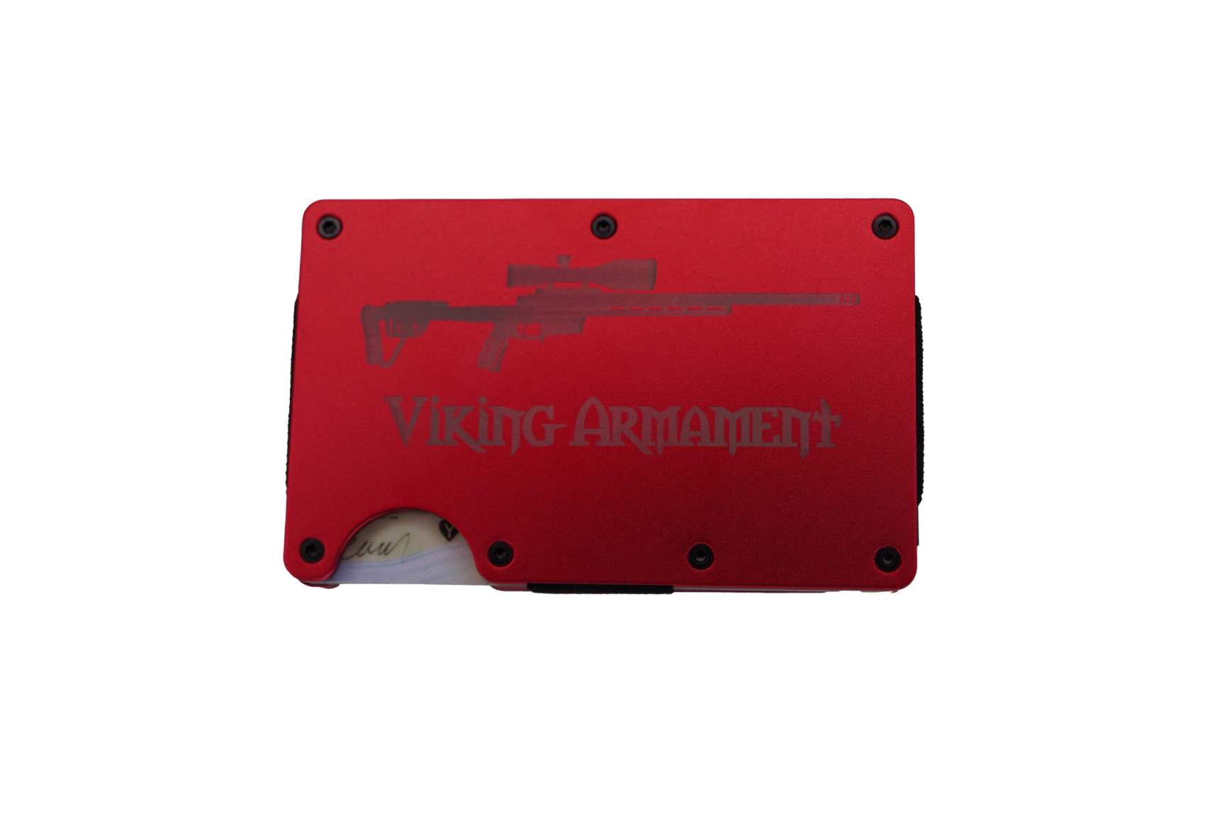VA Wallet Red Streamlined. Minimal. Built to last. The VA Wallet in Black is the perfect blend of function and form for anyone looking to slim down their carry without sacrificing capability. Crafted from lightweight, durable materials and engineered for a sleek, low-profile fit, this wallet is designed to handle the rigors of daily life while keeping your essentials secure. With RFID-blocking aluminum plates, it offers modern protection for your cards and identity. The compact design holds up to 8 cards comfortably and includes a robust cash clip to keep your bills tight and accessible. Whether you’re heading into the backcountry or out on the town, the VA Wallet delivers everyday reliability in a minimalist package. Machined hardware ensures the wallet stays rigid and secure, while its modular design allows for easy card access without unnecessary bulk. Its matte black finish gives it a sharp, tactical edge that pairs perfectly with your lifestyle—on or off the range. Components & Features: Lightweight, rugged aluminum construction RFID-blocking technology Elastic card retention – holds up to 12 cards Integrated cash strap Minimalist profile for front or back pocket carry Available in Red or Black anodized finish Notes: Durable enough for EDC, discreet enough for formal carry Designed for those who value both simplicity and performance 100% Made in the USA Elevate your everyday carry with the VA Wallet – where clean design meets real-world function. Ridge Wallet
