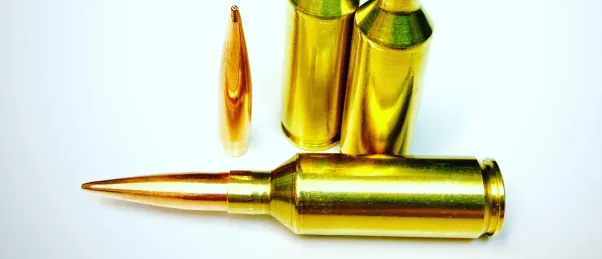 .25 SAUM: Magnum Power, Short Action Versatility The .25 SAUM — or .25 Short Action Ultra Magnum — is a wildcat that perfectly illustrates what modern hunters and long-range shooters demand: big speed, big energy, and impressive efficiency in a compact footprint. Originally inspired by necking down the .300 or 7mm Remington SAUM to accept .257" bullets, the .25 SAUM delivers magnum-class velocity with the practical benefits of a short-action platform. For Western hunters chasing mule deer, pronghorn, or even elk at extended distances, the .25 SAUM hits the sweet spot between the popular .25-06 Remington and larger magnums like the .257 Weatherby — without needing a long action or excessive barrel length. Pros of the .25 SAUM 1. Magnum-Level Velocity The .25 SAUM can push 115–131 grain bullets at 3,200–3,400 fps, depending on barrel length and load. That’s serious speed, translating to a flat trajectory and devastating terminal performance at longer ranges. 2. Short Action Efficiency Unlike the .25-06 or .257 Weatherby, the .25 SAUM fits perfectly in short-action rifles. This allows for lighter, more compact builds — ideal for backcountry hunters who cover big country on foot. 3. Great for Long-Range Hunting Thanks to its excellent velocity and ability to shoot high-BC .257" bullets (like the 131-grain Blackjack ACE), the .25 SAUM delivers fantastic energy retention and wind-bucking ability at 500+ yards. 4. Excellent Reloading Potential Handloaders appreciate the .25 SAUM for its efficient powder burn and brass longevity. Custom dies are easy to find from top makers, and forming brass is straightforward when starting with 7 SAUM or .300 SAUM parent cases. 5. Ideal for Custom Builds While you won’t find factory .25 SAUM rifles on the rack, this wildcat is right at home in a purpose-built custom rifle with a high-quality barrel, tuned action, and precision reamer specs. It’s a perfect match for carbon barrel mountain rifles or tactical long-range hunting rigs. Cons of the .25 SAUM 1. No Factory Ammo The .25 SAUM is purely a handloader’s cartridge. There’s no factory ammo or brass specifically headstamped “.25 SAUM” — so you’ll need to neck down and size cases, then dial in your own loads. 2. Barrel Life With high velocity and larger powder charges, throat erosion is faster than mild 6mm or .25-06 rounds. Most shooters see 1,500–2,000 rounds of peak accuracy depending on load and cleaning practices. 3. Recoil Management It’s still a magnum — so while recoil is manageable in a properly weighted rifle, it’s more noticeable than mild mid-caliber rounds like the 6.5 Creedmoor or .243 Win. Muzzle brakes or suppressors help tame the kick for long-range sessions. 4. Specialized Build Required You won’t find a factory .25 SAUM off the shelf. You’ll need a custom barrel chambered by a smith familiar with the wildcat, and a twist rate that matches your bullet choice — usually 1:8 or faster for modern high-BC .257" projectiles. Final Thoughts The .25 SAUM is a standout for shooters who want magnum reach in a short-action format. It delivers blistering speed, flat trajectories, and excellent energy on target — all while fitting into a lightweight, packable rifle perfect for Western hunting adventures. If you’re looking to push the limits of a .25 caliber rifle and you’re comfortable with handloading, the .25 SAUM offers a rewarding balance of performance, practicality, and custom rifle potential. Ready to build your .25 SAUM? At Viking Armament, we specialize in precision custom rifles chambered in high-performance wildcats like the .25 SAUM. Whether you’re after a lightweight carbon mountain rifle or a long-range predator rig, we’ll help you get the most from this hard-hitting cartridge. Contact us to plan your custom build today.