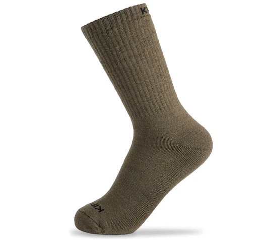 Merino Wool Socks – Size Large (10–13) When it comes to all-day comfort, durability, and performance in the outdoors, nothing compares to Merino wool. These Merino Wool Socks in size L (10–13) are built for hunters, hikers, and adventurers who demand warmth without bulk, breathability without compromise, and durability that lasts season after season. Whether you’re trekking through snow, crossing streams, or spending long hours in the backcountry, these socks provide the perfect balance of insulation and moisture management to keep your feet comfortable in any condition. Key Features & Benefits Premium Merino Wool Blend – Naturally insulating, soft, and breathable for year-round performance. Moisture-Wicking & Quick-Dry – Keeps feet dry by pulling sweat away from the skin, preventing blisters and hotspots. Odor Resistant – Natural Merino fibers resist bacteria buildup, keeping socks fresher for longer wear. Temperature Regulating – Warm in cold weather yet breathable in warmer conditions, making them versatile for all seasons. Reinforced Heel & Toe – Adds durability in high-wear areas, ensuring these socks hold up to tough terrain and repeated use. Cushioned Comfort – Provides impact absorption and support for long days on your feet. Size L (10–13) – Designed to fit men’s boot and shoe sizes within this range, offering a snug yet comfortable fit. Built for the Outdoors From backcountry hunting to everyday wear, these socks are designed to perform in extreme conditions. They dry quickly, resist odors, and maintain their insulating properties even when damp. Whether paired with hunting boots, hiking boots, or casual shoes, they deliver unmatched comfort and performance. Why Choose Merino? Unlike synthetic blends, Merino wool is naturally renewable and biodegradable, making it an eco-friendly choice without sacrificing performance.