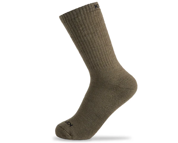 Merino Wool Socks – Size Large (10–13) When it comes to all-day comfort, durability, and performance in the outdoors, nothing compares to Merino wool. These Merino Wool Socks in size L (10–13) are built for hunters, hikers, and adventurers who demand warmth without bulk, breathability without compromise, and durability that lasts season after season. Whether you’re trekking through snow, crossing streams, or spending long hours in the backcountry, these socks provide the perfect balance of insulation and moisture management to keep your feet comfortable in any condition. Key Features & Benefits Premium Merino Wool Blend – Naturally insulating, soft, and breathable for year-round performance. Moisture-Wicking & Quick-Dry – Keeps feet dry by pulling sweat away from the skin, preventing blisters and hotspots. Odor Resistant – Natural Merino fibers resist bacteria buildup, keeping socks fresher for longer wear. Temperature Regulating – Warm in cold weather yet breathable in warmer conditions, making them versatile for all seasons. Reinforced Heel & Toe – Adds durability in high-wear areas, ensuring these socks hold up to tough terrain and repeated use. Cushioned Comfort – Provides impact absorption and support for long days on your feet. Size L (10–13) – Designed to fit men’s boot and shoe sizes within this range, offering a snug yet comfortable fit. Built for the Outdoors From backcountry hunting to everyday wear, these socks are designed to perform in extreme conditions. They dry quickly, resist odors, and maintain their insulating properties even when damp. Whether paired with hunting boots, hiking boots, or casual shoes, they deliver unmatched comfort and performance. Why Choose Merino? Unlike synthetic blends, Merino wool is naturally renewable and biodegradable, making it an eco-friendly choice without sacrificing performance.
