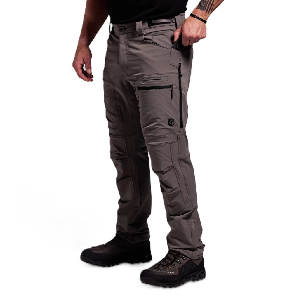 Men’s Frontier Pant 2.0 – Wolf Grey Built for serious back country hunters and outdoor professionals, the Frontier Pant 2.0 delivers a perfect balance of durability, comfort, and versatility. Designed to thrive in demanding environments, these pants are made to perform across a wide range of conditions—comfortable in 60°F weather but tough enough to handle frigid extremes when paired with a proper layering system. Constructed from a 4-way stretch fabric, the Frontier 2.0 moves with you rather than against you. Ensuring unrestricted mobility when climbing ridges, crawling through brush, or kneeling for a shot. The fabric is warm yet breathable, with side zip vents that allow you to regulate body temperature during high-exertion hunts. To enhance performance in wet or rugged terrain, the pants are finished with a durable water repellent coating. As well as reinforced in critical high-wear zones: the knees, seat, and heels. For extended backcountry use, the Frontier Pant 2.0 incorporates internal knee pad pockets for added protection and comfort during long glassing sessions or stalks. The pocket system is designed with hunters in mind—providing ample, versatile storage without bulk, keeping essential gear close at hand without hindering movement. Fit and comfort are equally important. The athletic cut is dialed in for active hunters who demand flexibility without sacrificing durability. Whether you’re navigating rocky terrain, trekking through snow, or waiting out long hours in the stand, these pants are engineered to adapt with you. Key Features 4-way stretch fabric for mobility and durability Water-repellent finish for all-weather performance Reinforced knees, seat, and heel for longevity Side-zip vents for temperature regulation Internal knee pad pockets for added comfort Athletic fit with versatile pocket system Conditions: 60°F to Frigid
