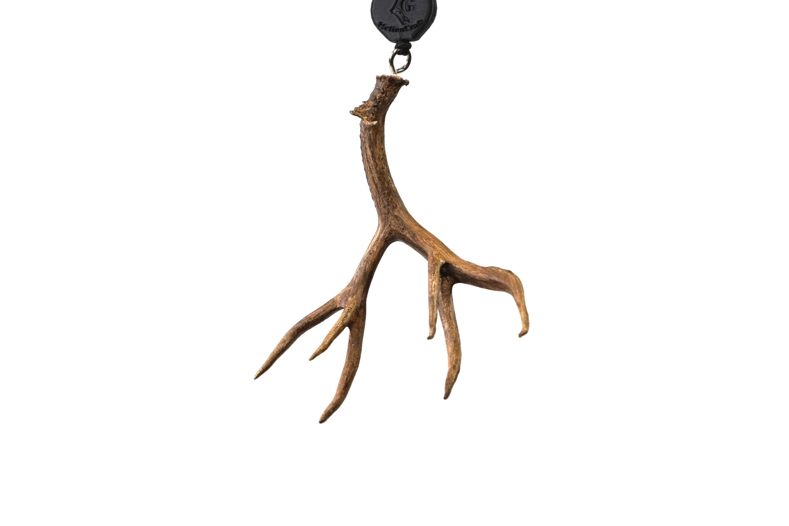 SG Motion Craft Deer Antler Danglers The SG Motion Craft Danglers are a unique way to bring your passion for the outdoors into your everyday drive. Designed and 3D-printed with precision, these miniature scale-model antlers are built to hang from your rearview mirror, adding a rugged yet stylish touch that reflects your love for hunting and the backcountry lifestyle. More than just an accessory, each Dangler is a conversation starter that showcases your connection to the field even when you’re on the road. What sets the SG Motion Craft Danglers apart is the ability to replicate any set of antlers. Whether it’s a once-in-a-lifetime bull elk, a heavy mule deer, or a buck that holds special meaning, we can craft a scale model directly from the antlers you bring into our shop. This customization ensures every Dangler is personal, carrying the story of your hunt in a compact, display-ready form. The 3D-printed construction guarantees clean details, durability, and consistency across every piece. Lightweight yet strong, these Danglers won’t damage your mirror or swing excessively while driving, making them practical for daily use. Their scale size provides the perfect balance between visibility and subtlety, ensuring they stand out without obstructing your view. Key Features: 3D Printed Precision – Captures fine antler detail in durable, lightweight form. Custom Options – We can model from any antlers you bring to our store. (Additional Cost) Unique Vehicle Accessory – A perfect way to showcase your hunting heritage on the go. Compact & Practical – Designed to hang safely without blocking visibility. Personalized Keepsake – Carry the memory of your hunt wherever you drive. Whether purchased as a custom keepsake or a one-of-a-kind gift for the hunter in your life, the SG Motion Craft Danglers blend tradition, innovation, and personalization in a product that celebrates the outdoors in everyday life.