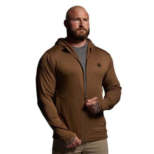 Quiver Full Zip Hoodie 2.0 The Quiver Full Zip Hoodie 2.0 is engineered for hunters who need a lightweight, versatile mid-layer that excels in both high-output activity and cold-weather layering systems. Built from advanced grid fleece fabric, this hoodie delivers the perfect balance of warmth, breathability, and weight reduction. The innovative grid-patterned interior traps and retains heat close to the body while simultaneously channeling airflow to disperse excess moisture and prevent overheating. Keeping you dry, comfortable, and focused in the field. Unlike traditional fleece layers, the Quiver 2.0’s design prioritizes adaptability. The full-length zipper provides quick, easy on/off and allows hunters to fine-tune their ventilation during changing conditions. Whether you’re climbing steep terrain, glassing in frigid winds, or moving between layers throughout the day, this hoodie ensures efficient temperature regulation. One of its most functional features is the integrated face mask, built into the hood for seamless concealment and added protection against sun, wind, or cold. Combined with the streamlined, athletic fit, the Quiver 2.0 ensures quiet movement through the brush and layers effortlessly under outer shells without adding unnecessary bulk. The result is a garment that adapts to everything from active early-season hunts to deep-winter pursuits when paired with heavier insulation. Durability is also a key focus. The high-quality fleece resists pilling and stands up to hard use, while the minimalist seams reduce friction points. Lightweight and packable, it fits easily into your system without weighing you down. Key Features: Grid Fleece Fabric – Lightweight warmth with enhanced airflow and moisture control. Full-Length Zipper – Easy layering and precise ventilation control. Integrated Face Mask – Added concealment and weather protection. Streamlined Fit – Quiet, bulk-free layering under outerwear. Recommended Conditions: 60°F to Frigid – Worn alone in mild conditions or as a mid-layer in extreme cold. The Quiver Full Zip Hoodie 2.0 is the ultimate balance of warmth, breathability, and versatility. Crafted for hunters who demand more from their layering system.