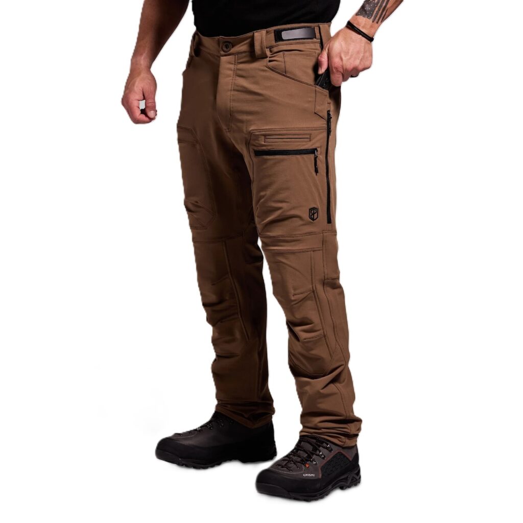 Men’s Frontier Pant 2.0 – Coyote Brown Built for serious back country hunters and outdoor professionals, the Frontier Pant 2.0 delivers a perfect balance of durability, comfort, and versatility. Designed to thrive in demanding environments, these pants are made to perform across a wide range of conditions—comfortable in 60°F weather but tough enough to handle frigid extremes when paired with a proper layering system. Constructed from a 4-way stretch fabric, the Frontier 2.0 moves with you rather than against you. Ensuring unrestricted mobility when climbing ridges, crawling through brush, or kneeling for a shot. The fabric is warm yet breathable, with side zip vents that allow you to regulate body temperature during high-exertion hunts. To enhance performance in wet or rugged terrain, the pants are finished with a durable water repellent coating. As well as reinforced in critical high-wear zones: the knees, seat, and heels. For extended backcountry use, the Frontier Pant 2.0 incorporates internal knee pad pockets for added protection and comfort during long glassing sessions or stalks. The pocket system is designed with hunters in mind—providing ample, versatile storage without bulk, keeping essential gear close at hand without hindering movement. Fit and comfort are equally important. The athletic cut is dialed in for active hunters who demand flexibility without sacrificing durability. Whether you’re navigating rocky terrain, trekking through snow, or waiting out long hours in the stand, these pants are engineered to adapt with you. Key Features 4-way stretch fabric for mobility and durability Water-repellent finish for all-weather performance Reinforced knees, seat, and heel for longevity Side-zip vents for temperature regulation Internal knee pad pockets for added comfort Athletic fit with versatile pocket system Conditions: 60°F to Frigid