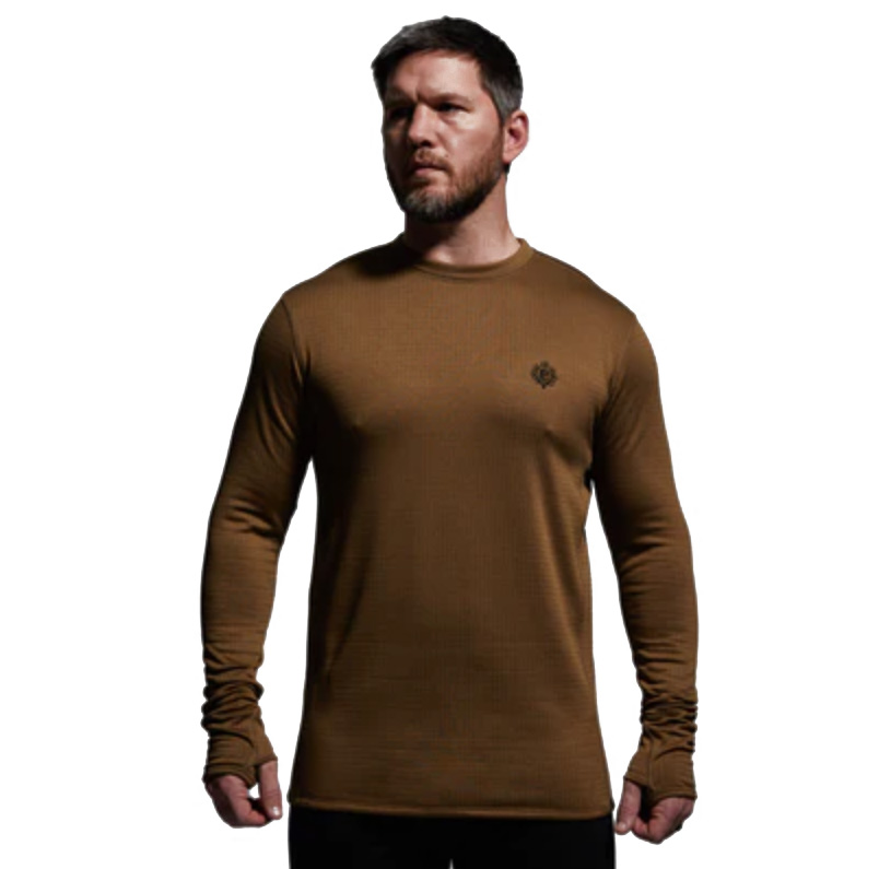 Men’s Quiver Long Sleeve Crew The Quiver Long Sleeve Crew is one of the most versatile pieces in our layering system, designed to keep you comfortable across a wide range of conditions and activity levels. Built with advanced gridTEK technology, this fully synthetic base layer provides exceptional warmth while maintaining breathability. The specialized grid construction reduces bulk by up to 20% compared to traditional base layers, creating air channels that enhance airflow, disperse moisture quickly, and regulate temperature during exertion. This makes the Quiver Crew equally at home as a lightweight stand-alone top in mild weather or as a dependable foundation under mid and outer layers in frigid conditions. Durable, flexible, and engineered for performance, the Quiver Long Sleeve Crew is made to handle the demands of active hunters, backcountry adventurers, and anyone who pushes their limits in unpredictable environments. Key Features: gridTEK Technology – Lightweight grid design improves warmth-to-weight ratio. Moisture-Wicking & Quick-Drying – Keeps you dry during high-output activities. Airflow Channels – Enhance breathability and temperature regulation. Lightweight Construction – Reduces bulk by up to 20%. Versatile Fit – Works as a stand-alone or foundational base layer. Recommended Conditions: 60°F to Frigid when paired with a mid layer and/or outer layer. From early-season scouting to late-season hunts, the Men’s Quiver Long Sleeve Crew delivers the adaptable performance you need to thrive in any environment.