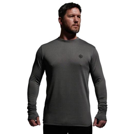 Men’s Quiver Long Sleeve Crew The Quiver Long Sleeve Crew is one of the most versatile pieces in our layering system, designed to keep you comfortable across a wide range of conditions and activity levels. Built with advanced gridTEK technology, this fully synthetic base layer provides exceptional warmth while maintaining breathability. The specialized grid construction reduces bulk by up to 20% compared to traditional base layers, creating air channels that enhance airflow, disperse moisture quickly, and regulate temperature during exertion. This makes the Quiver Crew equally at home as a lightweight stand-alone top in mild weather or as a dependable foundation under mid and outer layers in frigid conditions. Durable, flexible, and engineered for performance, the Quiver Long Sleeve Crew is made to handle the demands of active hunters, backcountry adventurers, and anyone who pushes their limits in unpredictable environments. Key Features: gridTEK Technology – Lightweight grid design improves warmth-to-weight ratio. Moisture-Wicking & Quick-Drying – Keeps you dry during high-output activities. Airflow Channels – Enhance breathability and temperature regulation. Lightweight Construction – Reduces bulk by up to 20%. Versatile Fit – Works as a stand-alone or foundational base layer. Recommended Conditions: 60°F to Frigid when paired with a mid layer and/or outer layer. From early-season scouting to late-season hunts, the Men’s Quiver Long Sleeve Crew delivers the adaptable performance you need to thrive in any environment.