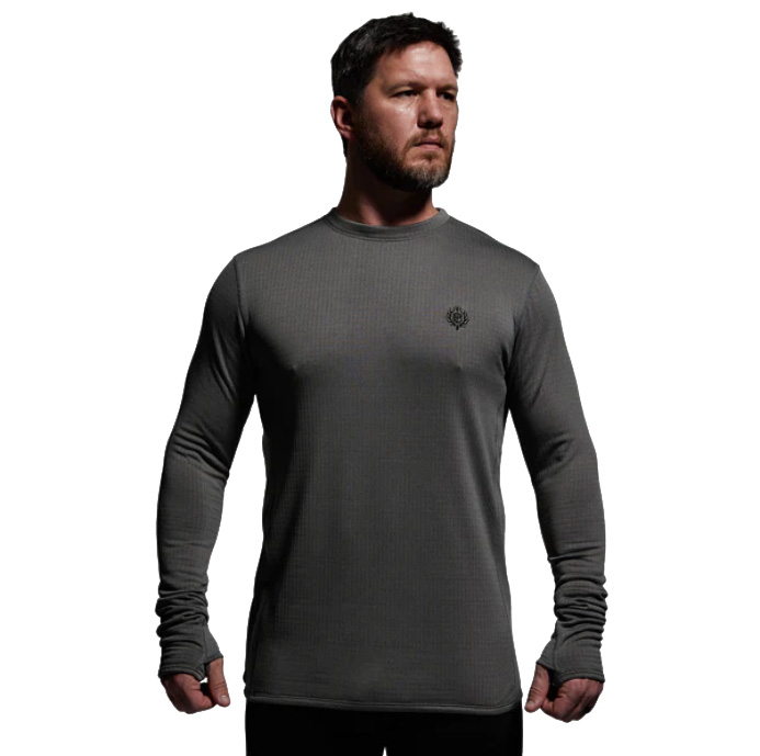 Men’s Quiver Long Sleeve Crew The Quiver Long Sleeve Crew is one of the most versatile pieces in our layering system, designed to keep you comfortable across a wide range of conditions and activity levels. Built with advanced gridTEK technology, this fully synthetic base layer provides exceptional warmth while maintaining breathability. The specialized grid construction reduces bulk by up to 20% compared to traditional base layers, creating air channels that enhance airflow, disperse moisture quickly, and regulate temperature during exertion. This makes the Quiver Crew equally at home as a lightweight stand-alone top in mild weather or as a dependable foundation under mid and outer layers in frigid conditions. Durable, flexible, and engineered for performance, the Quiver Long Sleeve Crew is made to handle the demands of active hunters, backcountry adventurers, and anyone who pushes their limits in unpredictable environments. Key Features: gridTEK Technology – Lightweight grid design improves warmth-to-weight ratio. Moisture-Wicking & Quick-Drying – Keeps you dry during high-output activities. Airflow Channels – Enhance breathability and temperature regulation. Lightweight Construction – Reduces bulk by up to 20%. Versatile Fit – Works as a stand-alone or foundational base layer. Recommended Conditions: 60°F to Frigid when paired with a mid layer and/or outer layer. From early-season scouting to late-season hunts, the Men’s Quiver Long Sleeve Crew delivers the adaptable performance you need to thrive in any environment.