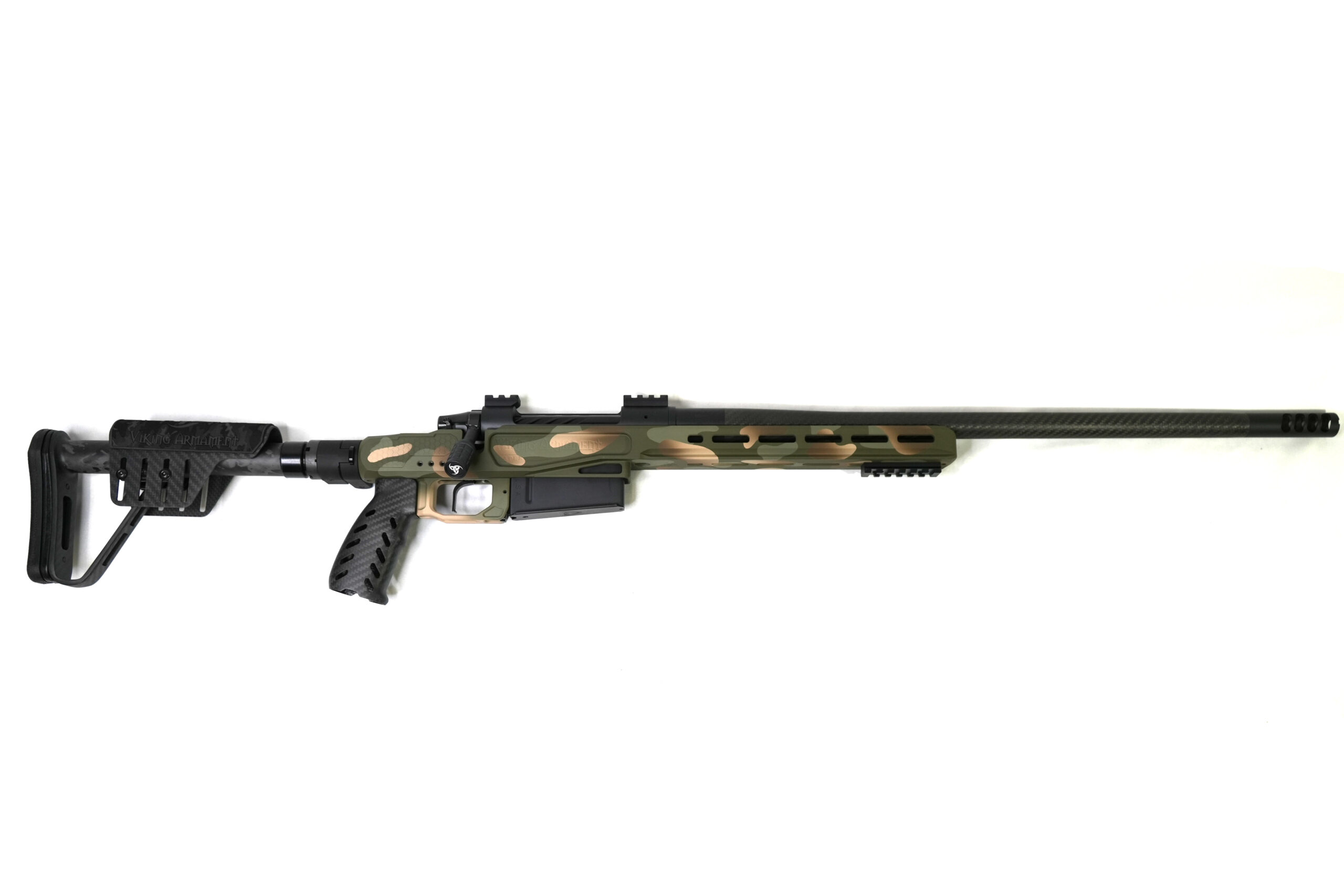 VA Apex – VA Apex 300 PRC Built for speed, precision, and backcountry performance, the VA Road Runner in 300 PRC is the ultralight weapon system you’ve been waiting for. Whether you're stalking game deep in no-man’s land or need a lightweight precision rifle you can rely on in the truck or on the trail. The Road Runner delivers strength without the weight. At its heart is the Viking Armament Outlaw stainless action. Paired with a premium 20” Benchmark Carbon Sendero barrel, chambered in the 300 PRC cartridge. Designed for hunters who demand power, accuracy, and flat shooting ballistics in a compact package. The barrel is finished with a gunsmith-timed MB&M 4 Port Muzzle Brake to reduce recoil and keep your crosshairs on target for fast follow-up shots. Our VA Road Runner Magnesium Chassis houses the build, which packs premium features while tipping the scale at a featherweight. The carbon fiber grip, cheek rest, and buttstock components keep the profile sleek and strong. The integrated folding adapter allows for ultimate portability, whether it's strapped to your pack or stowed away in the cab. Topped off with a Black Cerakote finish and black bolt assembly, this rifle doesn’t just perform—it looks the part too. Engineers build the Road Runner for those who go farther, push harder, and refuse to compromise on accuracy in extreme conditions. Specifications: Viking Outlaw Action Benchmark Carbon Sendero 22” 1:9 4 Port MB&M Timed Brake Trigger Tech Special Flat Bar Trigger Apex Aluminum Carbon Folding Chassis Carbon Grip Green Multicam Cerakote Sub ½ MOA Guarantee. 100% Made in the USA. Limited Lifetime Warranty Included.