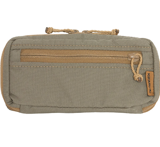 Kifaru Navigation Pouch The Kifaru Navigation Pouch is purpose-built for hunters, backcountry explorers, and tactical users who rely on fast, organized access to essential navigation tools. Designed with Kifaru’s signature durability and modular efficiency, this pouch provides a streamlined storage solution for GPS units, rangefinders, compasses, maps, notepads, and other mission-critical items that need to stay secure, protected, and immediately accessible in the field. Constructed from premium, high-denier materials and reinforced with bombproof stitching, the Navigation Pouch is engineered to withstand harsh environments—from dense timber and rocky alpine terrain to high-desert dust and unpredictable weather. Its semi-rigid structure maintains shape for easier one-handed operation, while the interior is thoughtfully laid out to maximize efficiency. Elastic loops, divider pockets, and a spacious main compartment make it simple to keep your gear organized and prevent delicate items from shifting or rattling. The exterior features a robust zipper system for reliable access, along with modular attachment points that integrate seamlessly with Kifaru packs, belts, chest rigs, or other MOLLE/PALS-compatible gear. This versatility allows the Navigation Pouch to be positioned exactly where you need it—whether that’s on your pack’s shoulder strap for quick on-the-go access, on the belt for minimalist setups, or mounted externally for rapid retrieval during high-pressure situations such as stalks or navigation checks. Slim, lightweight, and highly functional, the Navigation Pouch delivers exceptional accessibility without adding unnecessary bulk. Its weather-resistant design helps protect electronics and paper materials from moisture, dust, and abrasion, ensuring your navigational tools remain operational when conditions turn rough. For hunters and adventurers who depend on dependable gear management, the Kifaru Navigation Pouch provides a rugged, efficient, and highly adaptable storage solution—engineered to keep your critical navigation equipment organized and ready at a moment’s notice.