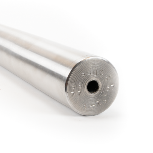 The Brux Stainless Steel Barrel Blank is widely regarded as one of the premier barrel options available for precision rifle builds. Brux Barrels, based in Lodi, Wisconsin, have earned a strong reputation among competitive shooters, custom rifle builders, and long-range enthusiasts for producing barrels capable of exceptional accuracy and consistency. Their barrels are commonly used in F-Class competition rifles, precision hunting builds, and custom tactical platforms where performance and repeatability are critical. Each barrel is crafted by experienced machinists who are also shooters, ensuring that real-world performance drives every stage of the manufacturing process. Every Brux barrel blank begins with double stress-relieved 416R stainless steel or 4150 chrome-moly bar stock, which is then precision drilled using high-quality gun-drilling equipment. After drilling, the bore is carefully reamed to exact tolerances before the rifling process begins. Brux uses a cut-rifling process, which removes a small amount of steel during each pass to form the rifling grooves. This method helps maintain extremely consistent bore geometry and minimizes internal stress within the barrel steel. Following rifling, each barrel is hand-lapped to produce an exceptionally smooth internal surface and uniform bore finish. Any barrel that does not meet strict tolerance and finish standards is rejected before leaving the shop. Brux barrel blanks are available in a wide range of calibers, twist rates, contours, and lengths, allowing gunsmiths to tailor the finished barrel to a specific rifle platform and cartridge. Many of their barrels utilize 4-groove conventional rifling, while larger calibers such as .338 and above often use 6-groove configurations to support heavier projectiles. Because these are supplied as unfinished blanks, they allow the gunsmith complete control over the final configuration of the barrel. The tenon can be cut to match the rifle action, the chamber can be cut to exact specifications, and the muzzle can be threaded or crowned depending on the build requirements. Components Brux precision cut-rifled stainless steel barrel blank Premium 416R stainless steel barrel steel Precision drilled and reamed bore Hand-lapped internal finish Available in multiple calibers, twist rates, contours, and lengths Notes This barrel blank is NOT chambered or threaded. A qualified gunsmith is required to chamber, thread, and properly install the barrel. Twist rates, contours, and finished lengths vary depending on caliber and application. Customers must call for available options and current lead times before ordering. The Brux Stainless Steel Barrel Blank provides an exceptional starting point for precision rifle builds where accuracy and consistency are the top priorities. When properly chambered and installed by an experienced gunsmith, Brux barrels are capable of delivering the level of precision required by competitive shooters, serious hunters, and custom rifle builders.