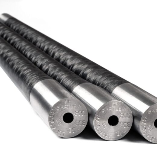 The Bartlein Carbon Fiber Wrapped Barrel Blank combines the legendary accuracy of Bartlein’s cut-rifled barrels with modern carbon fiber technology to create a lightweight yet extremely rigid barrel platform. Bartlein Barrels are widely respected throughout the precision rifle community and are used by competitive shooters, custom rifle builders, and military teams around the world. Their barrels are produced using single-point cut rifling, a process known for creating extremely uniform bore geometry while minimizing internal stress in the steel. This results in excellent consistency, repeatability, and long-term accuracy potential. Each Bartlein carbon barrel begins with a precision cut-rifled stainless steel barrel core, which is drilled, reamed, honed, and rifled to extremely tight tolerances. The barrel core is then wrapped in high-strength carbon fiber that significantly reduces overall barrel weight while maintaining rigidity. Compared to traditional all-steel barrels of similar contour, carbon wrapped barrels can provide approximately 20–25% weight reduction, making them extremely attractive for lightweight hunting rifles and backcountry builds. Bartlein carbon barrels are available in multiple calibers, twist rates, contours, and finished lengths, allowing gunsmiths to configure the barrel for specific cartridges and rifle platforms. Common contours include configurations similar to Remington Varmint/Sendero and M24/M40 profiles, which provide excellent rigidity while still maintaining reduced weight. Because these are supplied as unfinished barrel blanks, they allow a gunsmith to cut the chamber, thread the muzzle, and machine the tenon to match the exact action and cartridge specifications of the rifle being built.